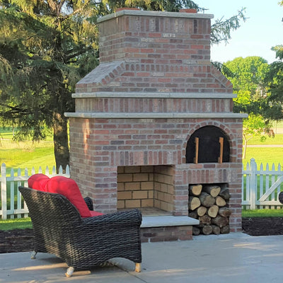 Outdoor Fireplace with Pizza Oven - A Perfect Red Brick Outdoor Oasis