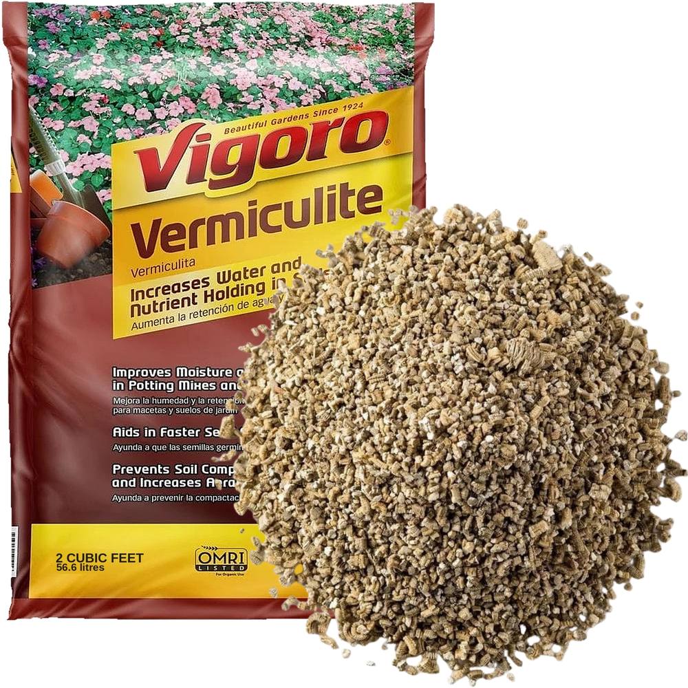 Bag of vermiculite and a pile of gold vermiculite flakes for DIY pizza oven insulation